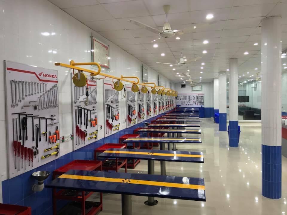 Ghaffar Honda Center workshop floor with multiple service lifts
